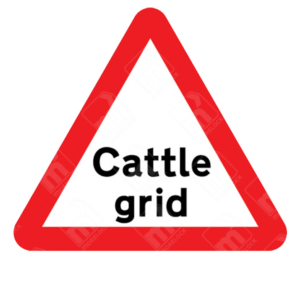 Cattle Grid Ahead Warning Sign – Diagram 552 showing bold black text within red triangle, warning drivers of livestock barrier on rural roads