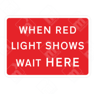 When Red Light Shows Wait Here Sign – Diagram 7011 – Official UK temporary road sign instructing drivers to stop and wait when the red light appears.