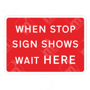 When Stop Sign Shows Wait Here Sign – Diagram 7011D – Official UK temporary road sign instructing drivers to stop and wait when the stop sign is displayed.