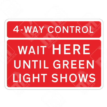 4-Way Control Wait Here Until Green Light Shows Sign – Temporary UK traffic sign instructing vehicles to stop and wait at a controlled junction.