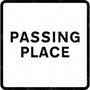 Passing Place Sign (Diagram 822) – UK road sign indicating a designated area for vehicles to pull aside and allow traffic to pass safely.