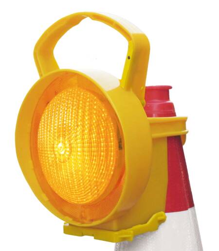 Nissen Amber Coni Lamp – High-visibility LED warning light securely mounted on a traffic cone for UK road safety applications.