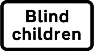 Blind Children Road Sign – Permanent UK traffic sign warning drivers to be cautious in areas where blind children may be present.